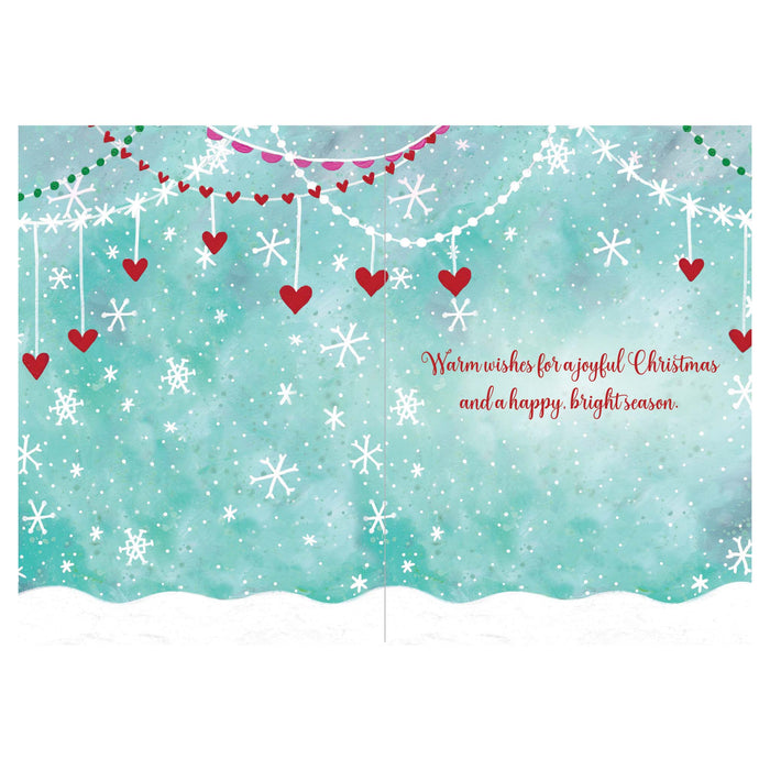 Christmas-themed card with snowflakes, hearts, and a message on a blue background