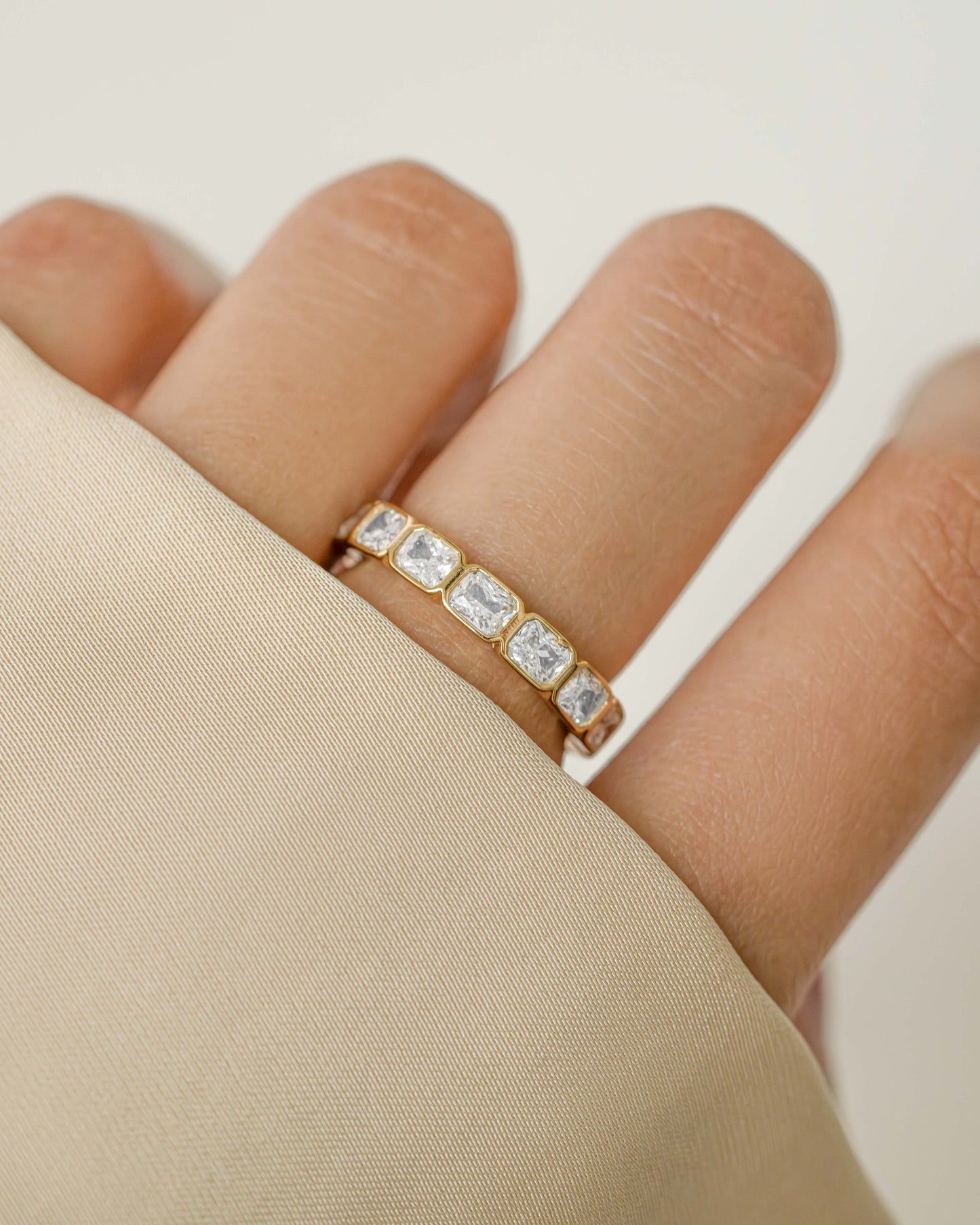 Bezel Emerald Cut Eternity Band