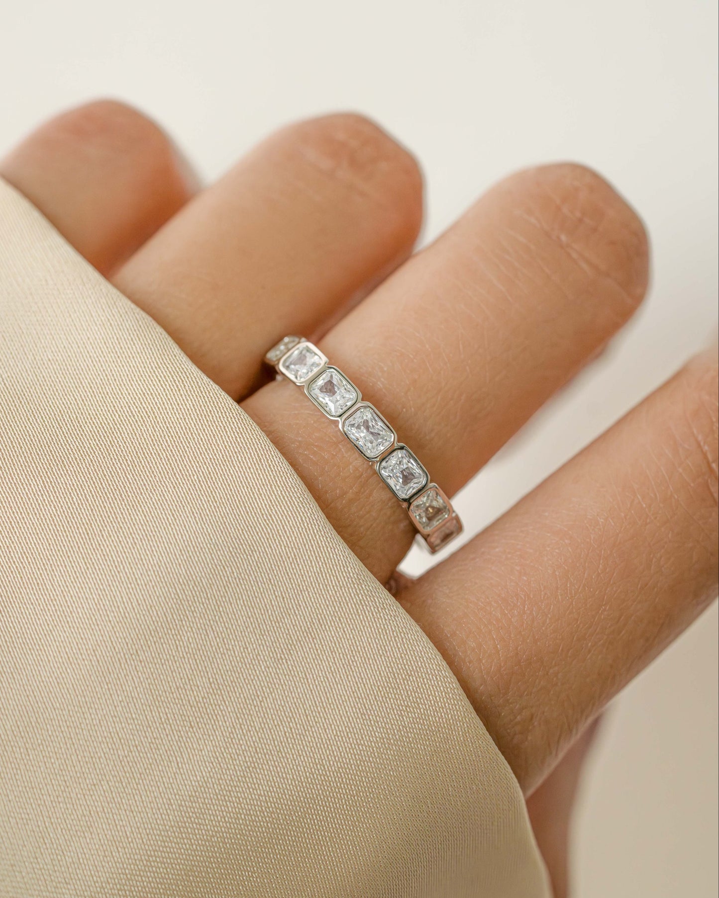 Bezel Emerald Cut Eternity Band