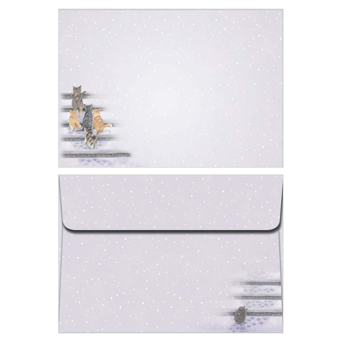 Set of earrings and a matching pouch with polka dot pattern on a white background
