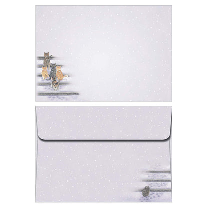 Set of earrings and a matching pouch with polka dot pattern on a white background