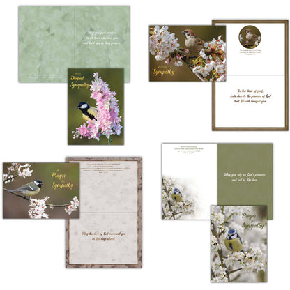 An assortment of religious sympathy greeting cards displayed in a neat arrangement. Each card features uplifting messages, Bible verses, and faith-inspired designs and elegant typography.