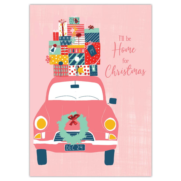 Illustration of a pink car with Christmas gifts and wreath on a pink background with 'I'll be Home for Christmas' text.