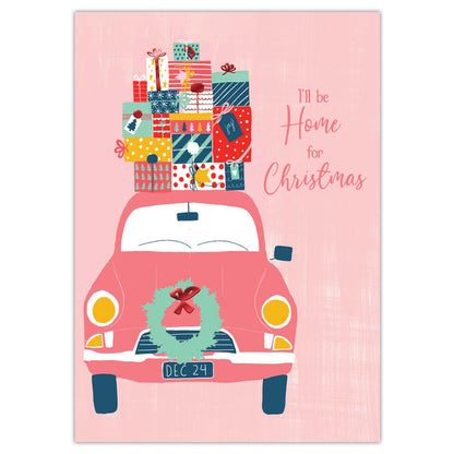 Illustration of a pink car with Christmas gifts and wreath on a pink background with 'I'll be Home for Christmas' text.