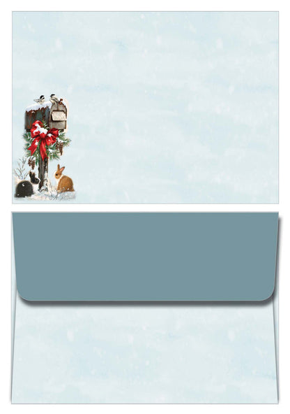 Christmas-themed envelope on a light blue background