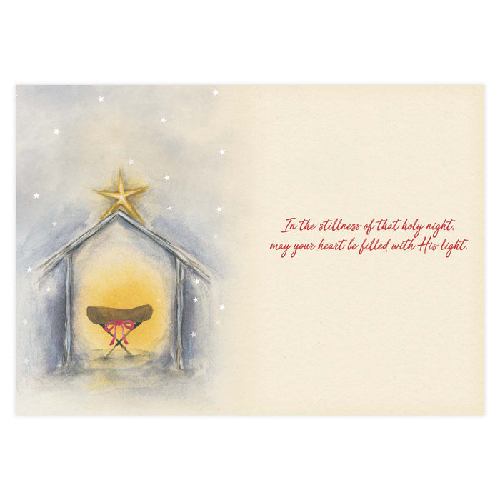 Nativity scene with star on a light background, featuring a Christmas message.
