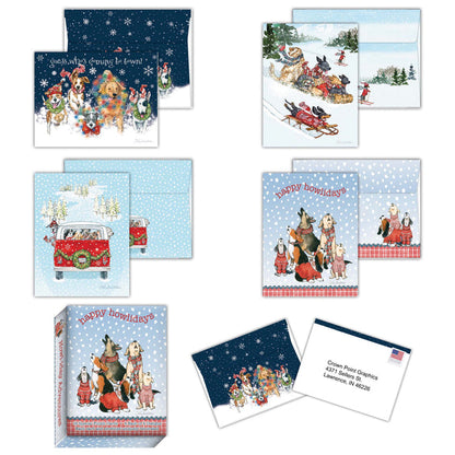 Collection of Christmas-themed greeting cards with festive designs featuring dogs and winter scenes.