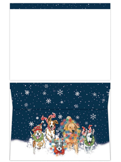 Christmas-themed envelope with dogs and snowflakes on a blue background