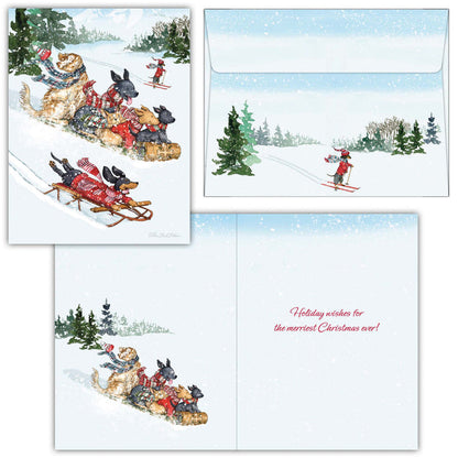 Set of Christmas cards with winter scene and dogs on a sleigh.