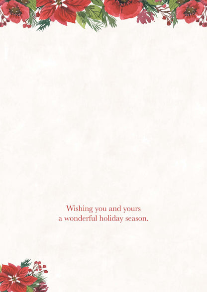 Holiday card with red poinsettias and greenery on a white background with a red text message.