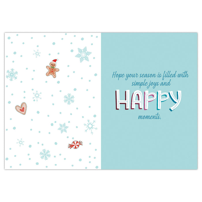Holiday card with gingerbread man, snowflakes, and candy on a white background with a blue text box.