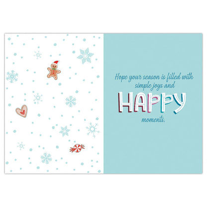 Holiday card with gingerbread man, snowflakes, and candy on a white background with a blue text box.