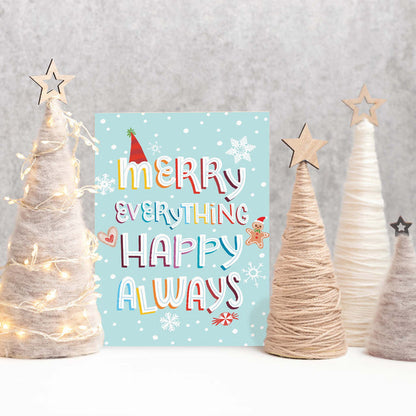 Christmas card with colorful text surrounded by decorative trees on a gray background