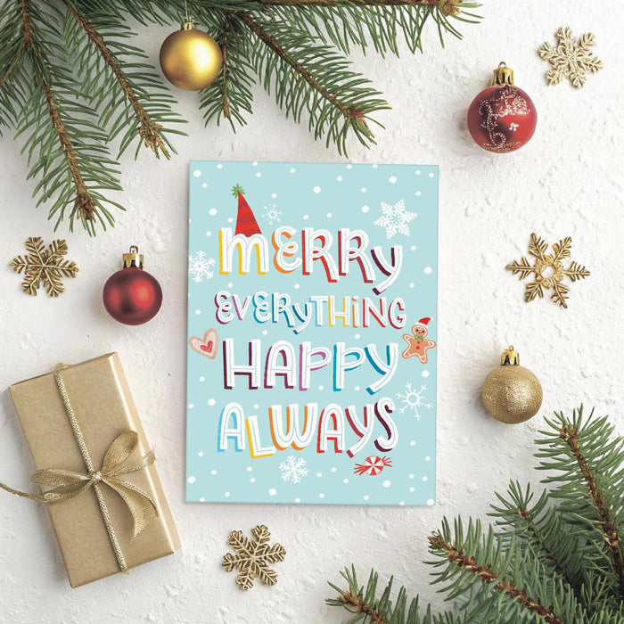 Christmas card with 'Merry Everything Happy Always' text, surrounded by festive decorations on a white background.