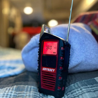 Odyssey Hand Crank AM/FM Radio, in use