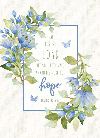 Floral design with blue flowers and green leaves, featuring a biblical quote.