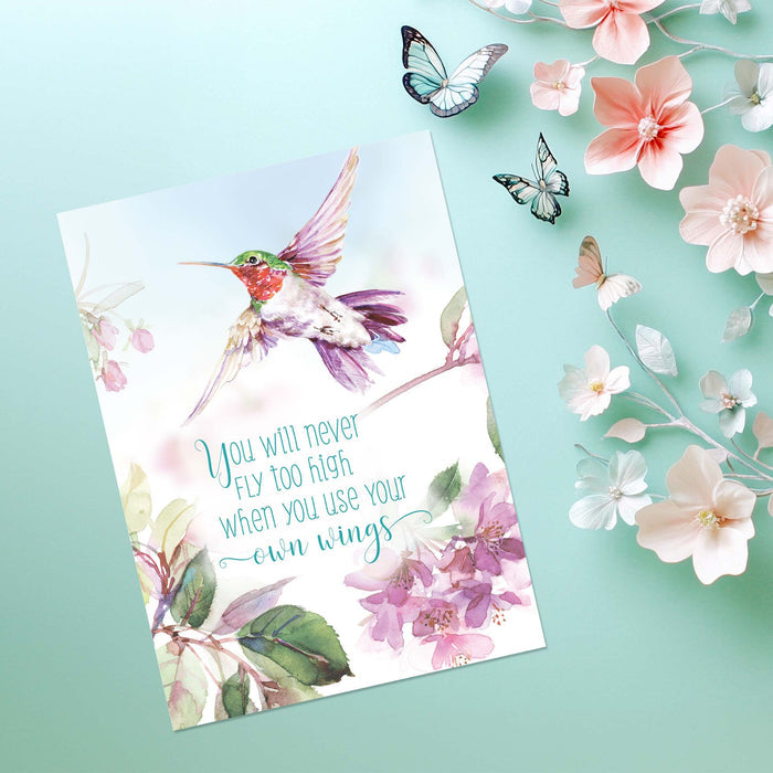 Motivational card with a hummingbird illustration and floral design on a light blue background.