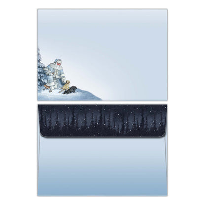 Greeting card with a snowy scene and envelope on a white background