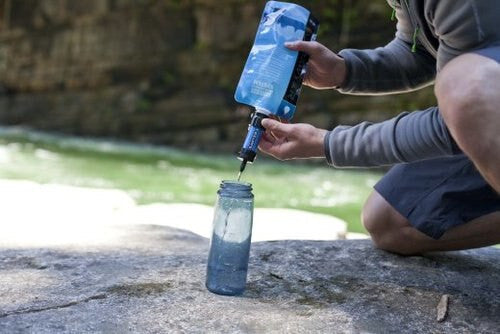 Sawyer® MINI Water Filter, filling up water bottle