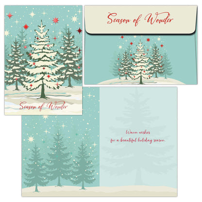 Set of Christmas cards with snowy trees and 'Season of Wonder' text on a blue background.