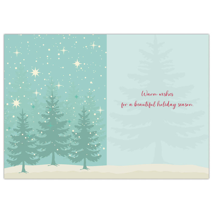 Holiday card with trees and stars on a light blue background