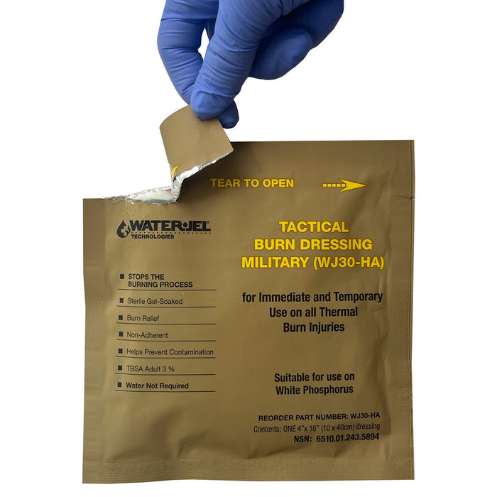 Water-Jel® Military Burn Dressing, being opened
