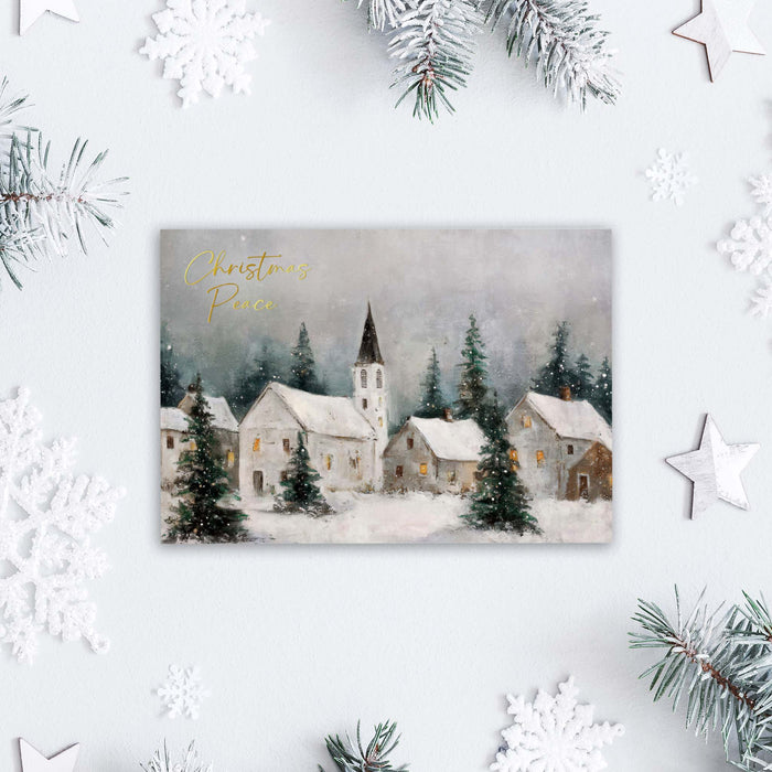 Christmas card with a snowy village scene and 'Christmas Peace' text, surrounded by festive decorations.