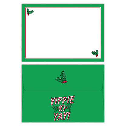 Green Christmas card with holly design and 'Yippie Ki Yay!' text on a white background